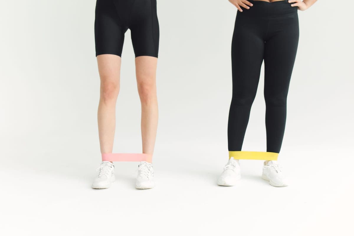 Resistance bands laid out on a wooden floor