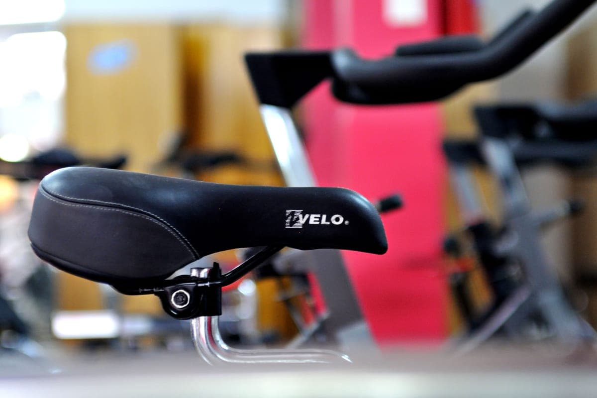 An indoor cycling bike in a home gym